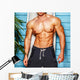 Studio shot,surfer and his swimming deck Wall Decal
