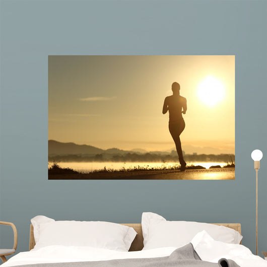 Runner woman silhouette running at sunset Wall Decal