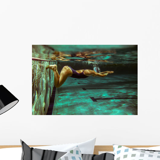 Swimmer at the swimming pool.Underwater photo. Wall Decal