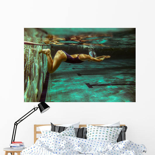 Swimmer at the swimming pool.Underwater photo. Wall Decal