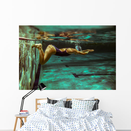 Swimmer at the swimming pool.Underwater photo. Wall Decal
