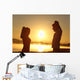 Silhouette of a fitness couple stretching at sunrise Wall Decal