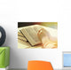 Hands of old woman with Bible on table Wall Mural