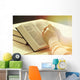 Hands of old woman with Bible on table Wall Mural