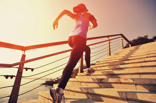 Young Fitness Woman Running On Seaside Stone Stairs Wall Decal 2
