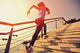 Young Fitness Woman Running On Seaside Stone Stairs Wall Decal 2
