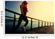 young fitness woman running on sunrise seaside boardwalk Wall Mural