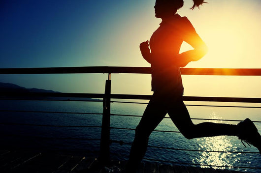 Young Fitness Woman Running On Sunrise Seaside Boardwalk Wall Decal