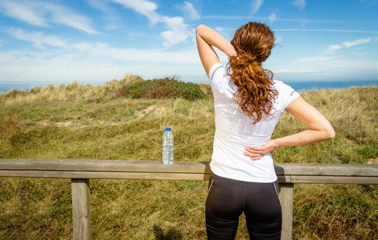 Athletic Woman Touching Neck And Back Muscles By Injury Wall Decal
