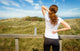 Athletic Woman Touching Neck And Back Muscles By Injury Wall Decal