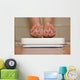 Feet on bathroom scale with hand drawn sad cute faces Wall Mural