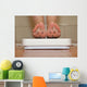 Feet on bathroom scale with hand drawn sad cute faces Wall Mural