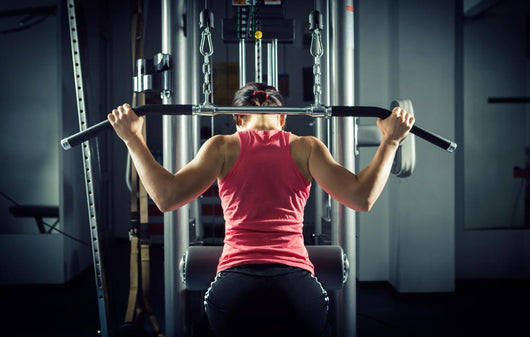 Sports Background. Muscular Fit Woman Exercising. Wall Decal