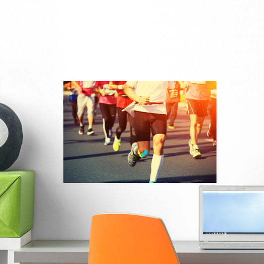 marathon runner legs running on city street Wall Mural