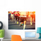 marathon runner legs running on city street Wall Mural