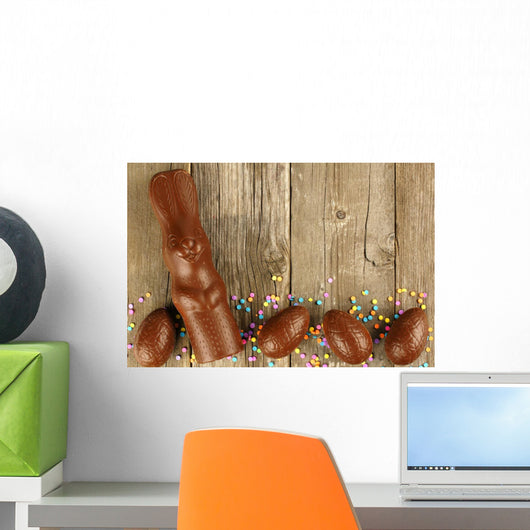 Chocolate Easter eggs and bunny border on wood Wall Mural