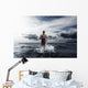 Young woman athlete running out of water Wall Mural