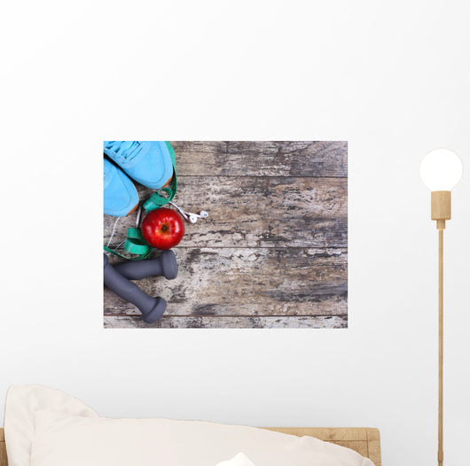 Sport equipment. Sneakers, dumbells, measuring tape Wall Mural