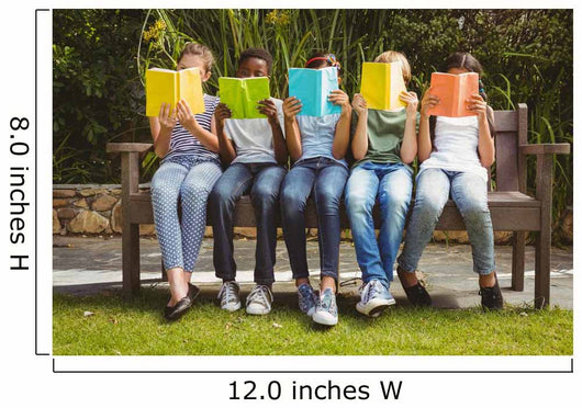 Children reading books at park Wall Mural