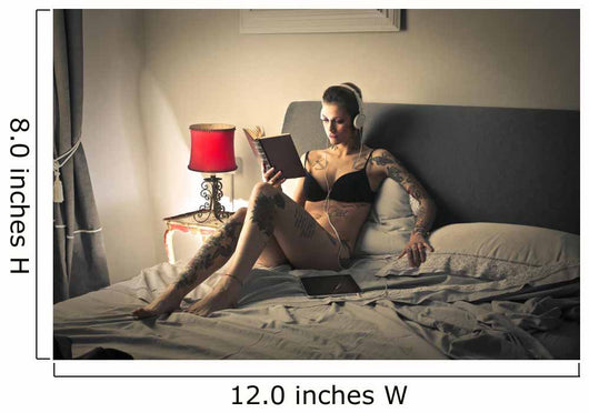 Tattooed girl reading Wall Mural