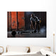 Bald charismatic athlete doing squats with weights. Wall Mural
