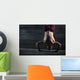 Athlete with naked torso doing push-ups on his hands while stand Wall Mural