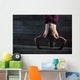Athlete with naked torso doing push-ups on his hands while stand Wall Mural