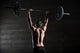 Portrait Of A Handsome Athlete From Behind. Athlete Raises The B Wall Decal