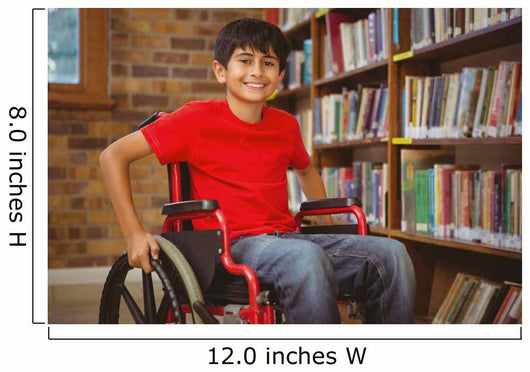 Portrait of boy sitting in wheelchair at library Wall Mural