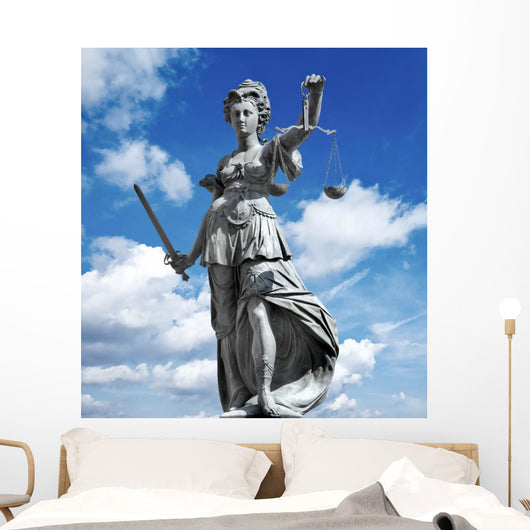 justitia in blue sky Wall Mural