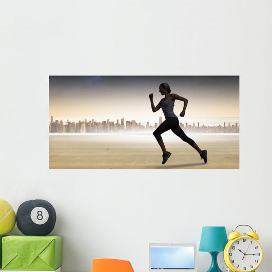 Composite image of pretty fit blonde jogging Wall Mural