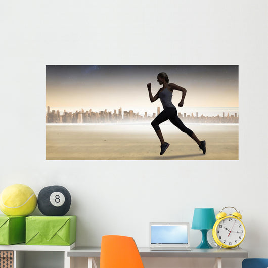 Composite image of pretty fit blonde jogging Wall Mural