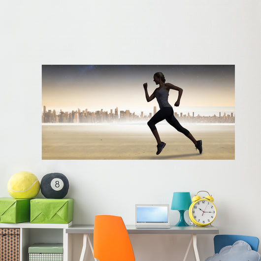 Composite image of pretty fit blonde jogging Wall Mural