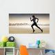 Composite image of pretty fit blonde jogging Wall Mural