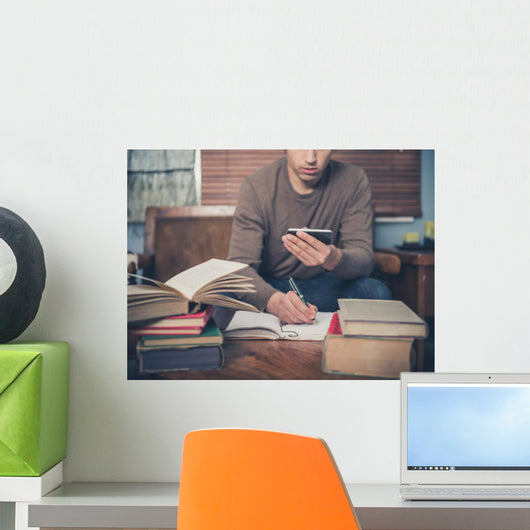 Man Studying and Using Wall Decal