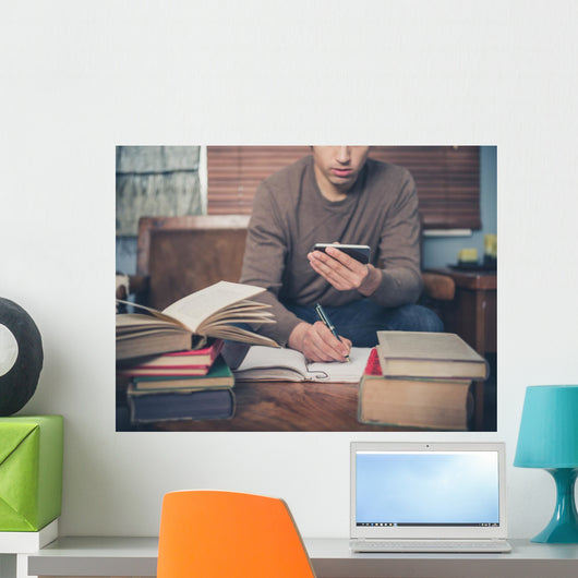 Man Studying and Using Wall Decal