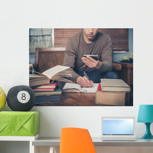 Man Studying and Using Wall Decal