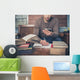 Man Studying and Using Wall Decal