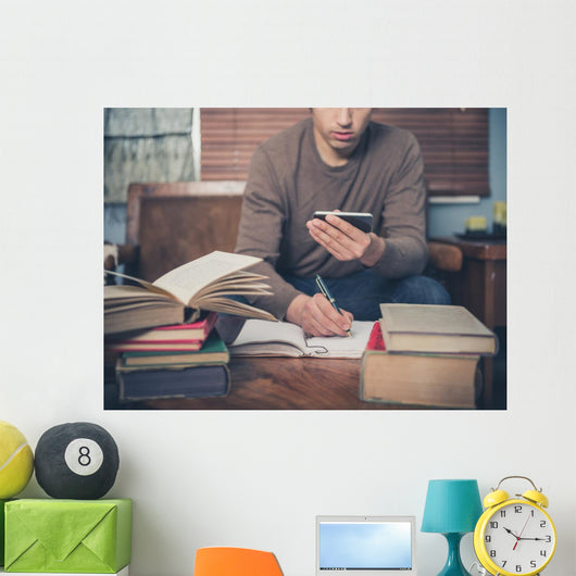Man Studying and Using Wall Decal