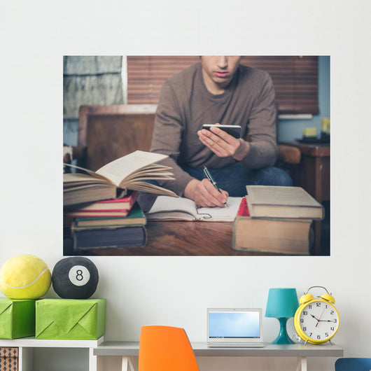 Man Studying and Using Wall Decal