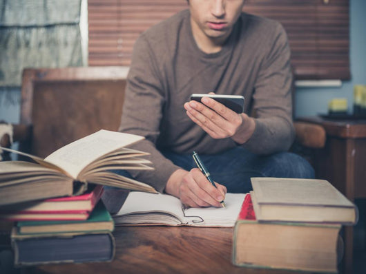Man Studying and Using Wall Decal