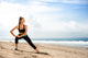 Sportswoman Doing Exercises Beach Wall Decal