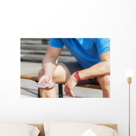 Athlete Checking Fitness Data Wall Decal