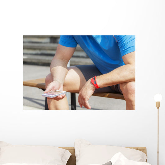 Athlete Checking Fitness Data Wall Decal