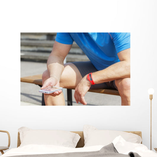 Athlete Checking Fitness Data Wall Decal