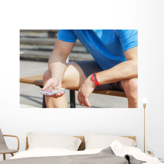 Athlete Checking Fitness Data Wall Decal