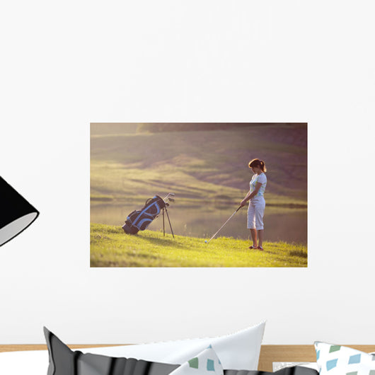 Young Female Playing Golf Wall Decal