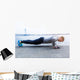 Young athlete is doing push ups Wall Mural