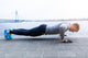 Young athlete is doing push ups Wall Mural
