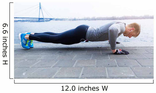 Young athlete is doing push ups Wall Mural